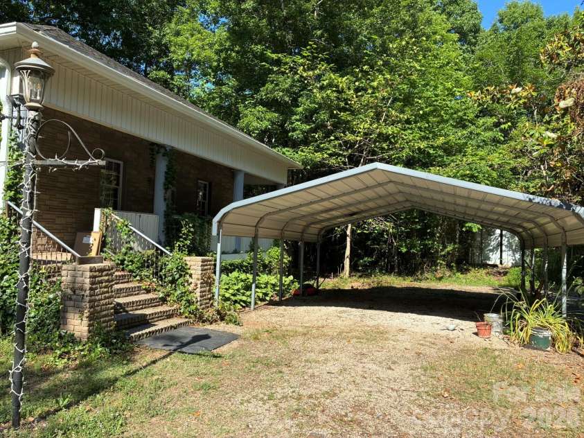 2051 Sutton Spring Road, York, SC 29745.  MLS# CAR4383938, YatesRealty ID 25388. 2-car carport
