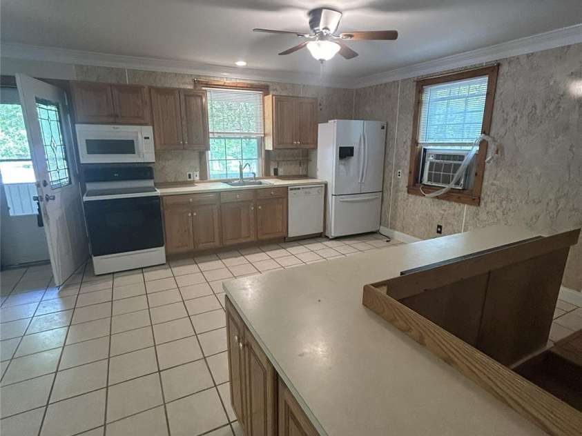 2051 Sutton Spring Road, York, SC 29745.  MLS# CAR4383938, YatesRealty ID 25388. Kitchen with cabinets