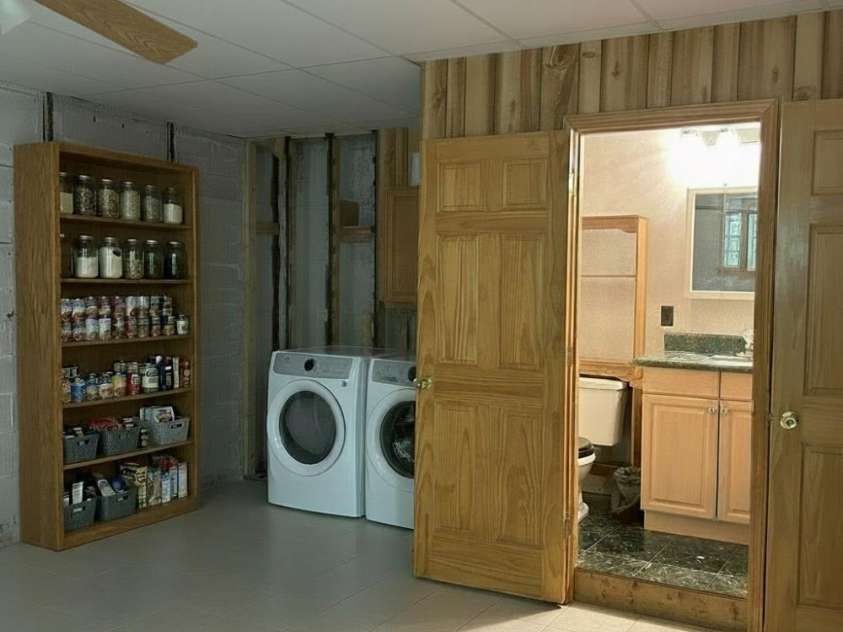 2051 Sutton Spring Road, York, SC 29745.  MLS# CAR4383938, YatesRealty ID 25388. VIRTUALLY STAGED basement laundry area