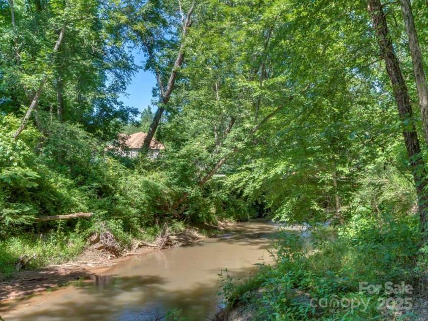 60 Bridge Lane, Tryon, NC 28782.  MLS# CAR4280439, YatesRealty ID 25389. 