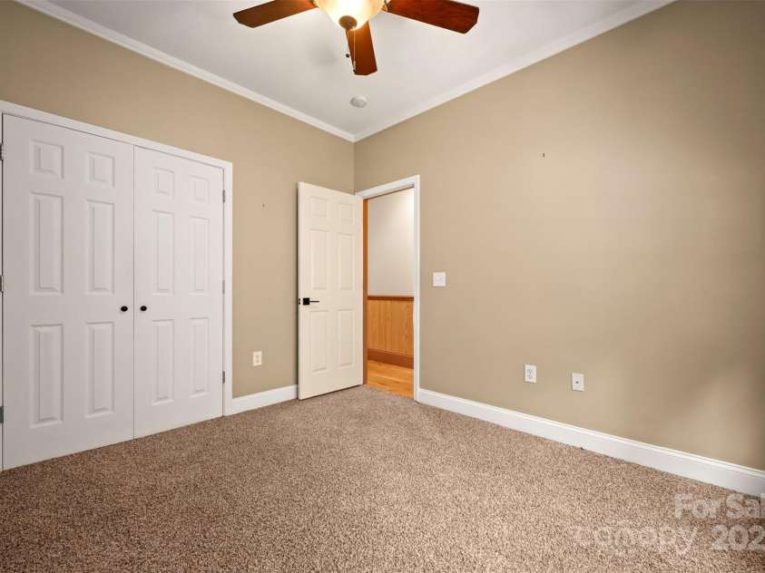 60 Bridge Lane, Tryon, NC 28782.  MLS# CAR4280439, YatesRealty ID 25389. Main Level Guest Bedroom
