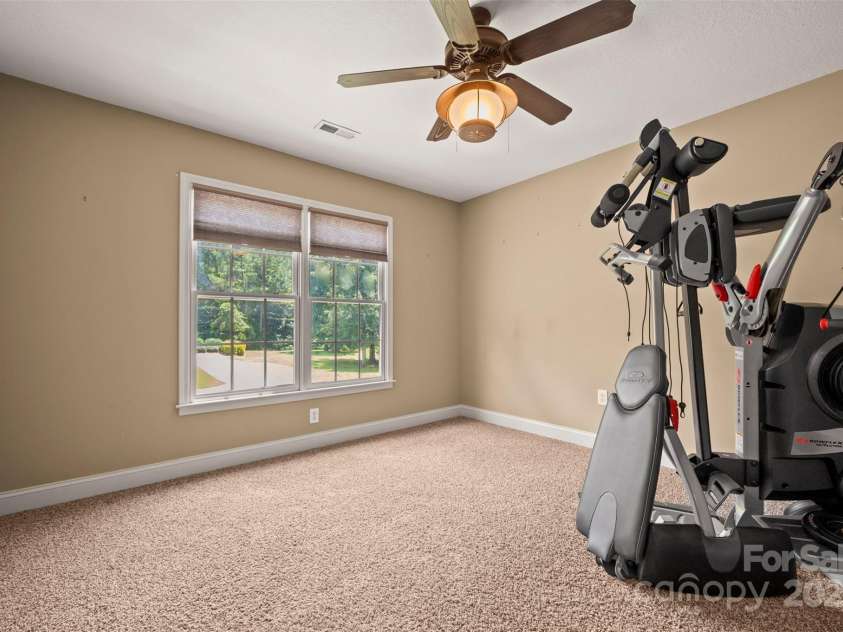 60 Bridge Lane, Tryon, NC 28782.  MLS# CAR4280439, YatesRealty ID 25389. Upper Level Guest Bedroom