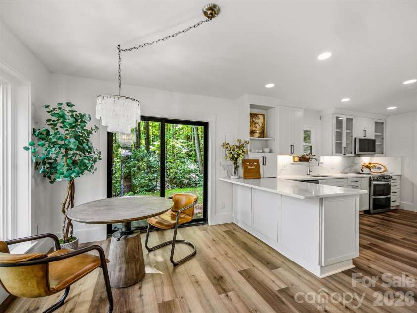 81 Summer Trees Lane, Burnsville, NC 28714.  MLS# CAR4417537, YatesRealty ID 25389. Breakfast nook with potential breakfast bar - just add stools.