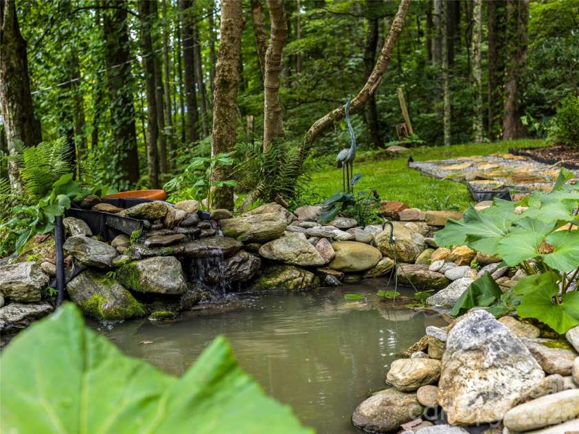 81 Summer Trees Lane, Burnsville, NC 28714.  MLS# CAR4417537, YatesRealty ID 25389. Fish Pond