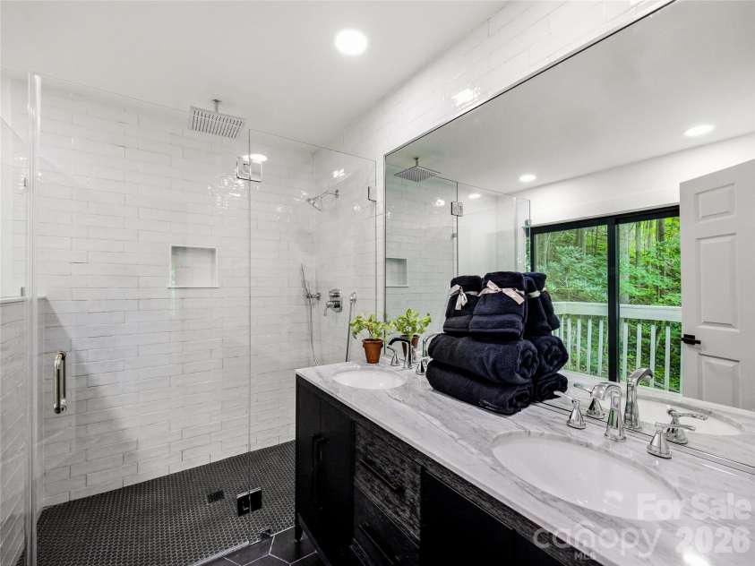 81 Summer Trees Lane, Burnsville, NC 28714.  MLS# CAR4417537, YatesRealty ID 25389. Master bath updated with dual sinks.