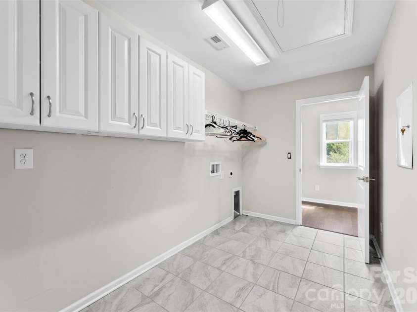 751 Waterford Glen Way, Rock Hill, SC 29730.  MLS# CAR4357653, YatesRealty ID 25390. Laundry room connected to primary walk-in closet