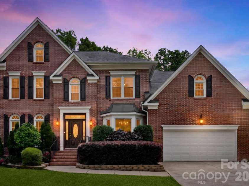 7618 Wingmont Drive, Charlotte, NC 28269.  MLS# CAR4382505, YatesRealty ID 25391. Front Exterior - Twilight