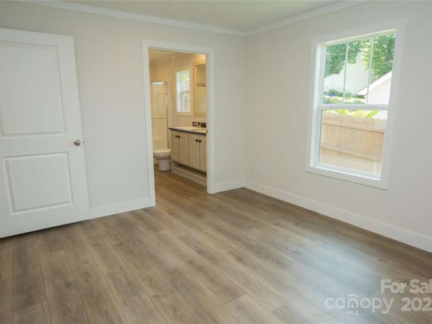 30 Babb Street, Waynesville, NC 28786.  MLS# CAR4280509, YatesRealty ID 25394. Primary Bedroom
