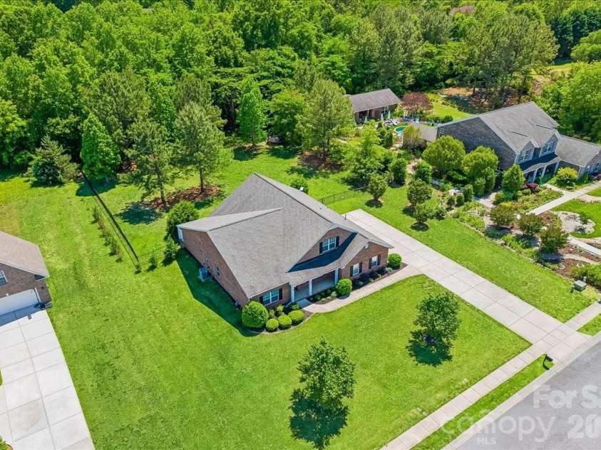 1006 Spring Rose Lane, Matthews, NC 28104.  MLS# CAR4382311, YatesRealty ID 25396. 