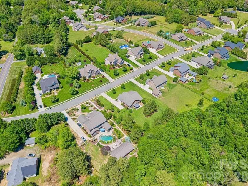 1006 Spring Rose Lane, Matthews, NC 28104.  MLS# CAR4382311, YatesRealty ID 25396. 