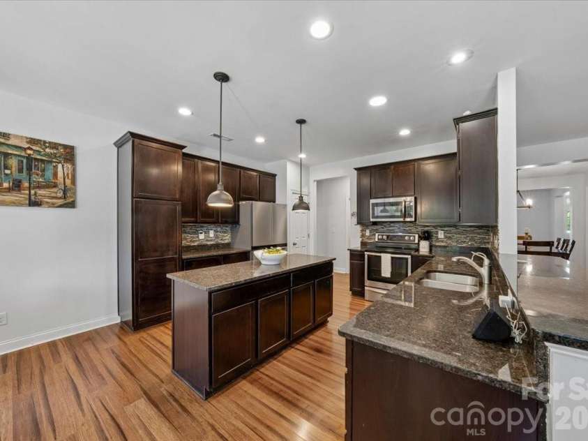 1006 Spring Rose Lane, Matthews, NC 28104.  MLS# CAR4382311, YatesRealty ID 25396. Kitchen