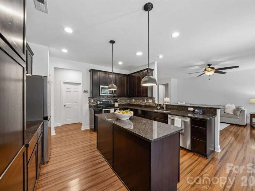 1006 Spring Rose Lane, Matthews, NC 28104.  MLS# CAR4382311, YatesRealty ID 25396. Kitchen