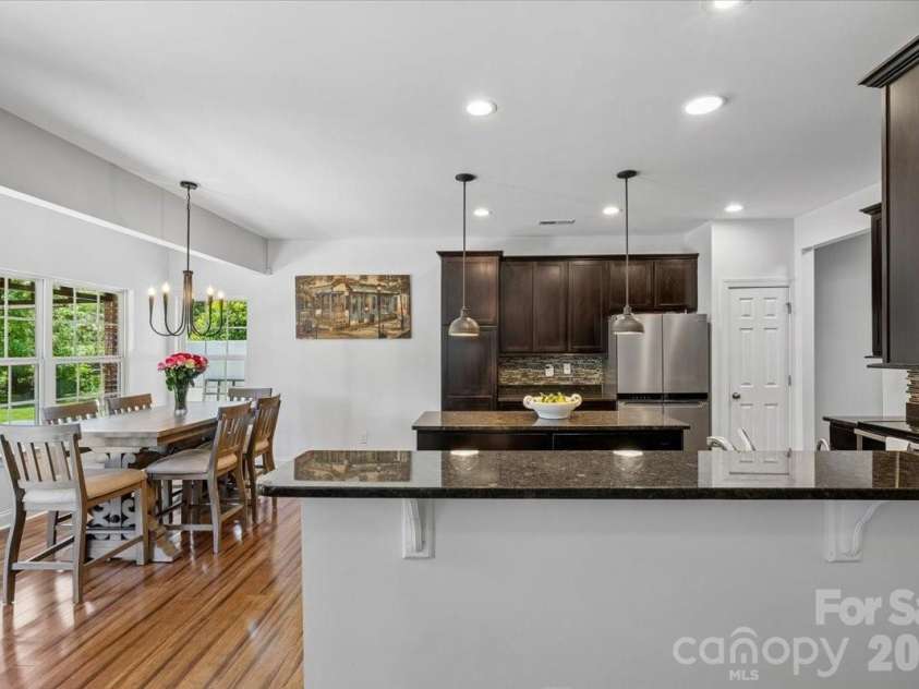 1006 Spring Rose Lane, Matthews, NC 28104.  MLS# CAR4382311, YatesRealty ID 25396. Kitchen