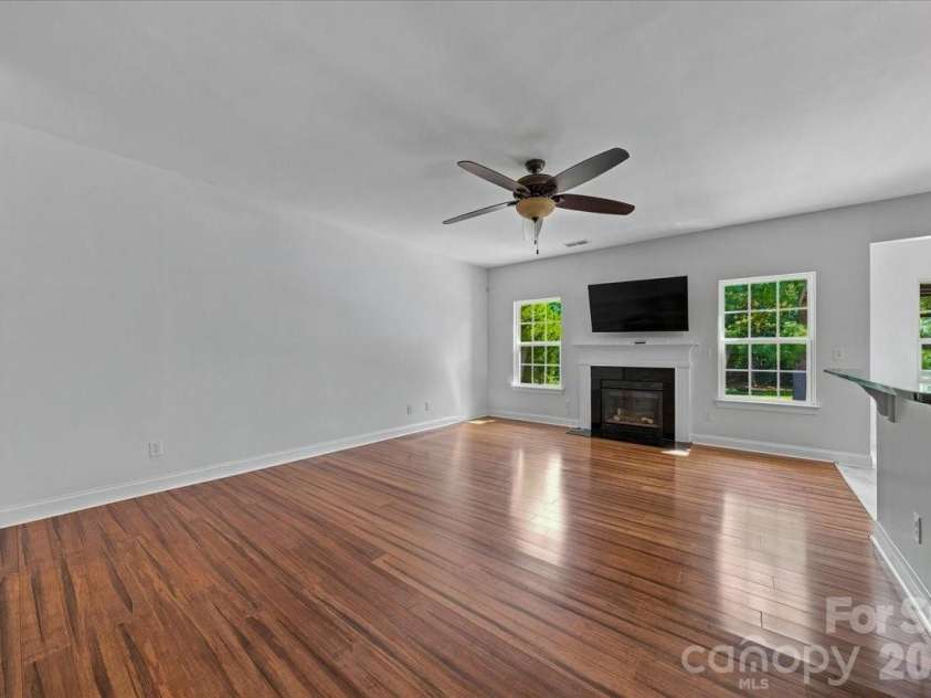 1006 Spring Rose Lane, Matthews, NC 28104.  MLS# CAR4382311, YatesRealty ID 25396. Living Room