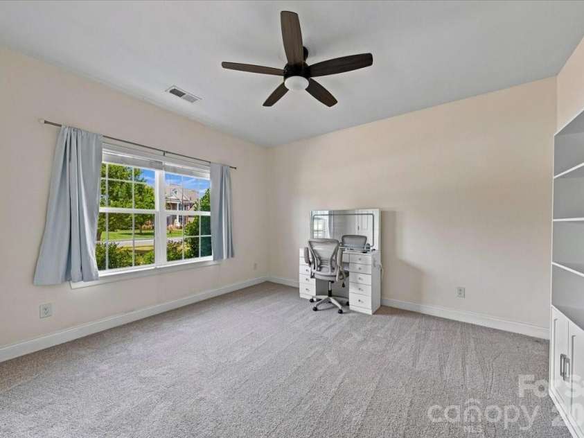 1006 Spring Rose Lane, Matthews, NC 28104.  MLS# CAR4382311, YatesRealty ID 25396. Second Bedroom *new carpet*
