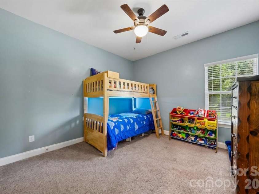 1006 Spring Rose Lane, Matthews, NC 28104.  MLS# CAR4382311, YatesRealty ID 25396. Third Bedroom