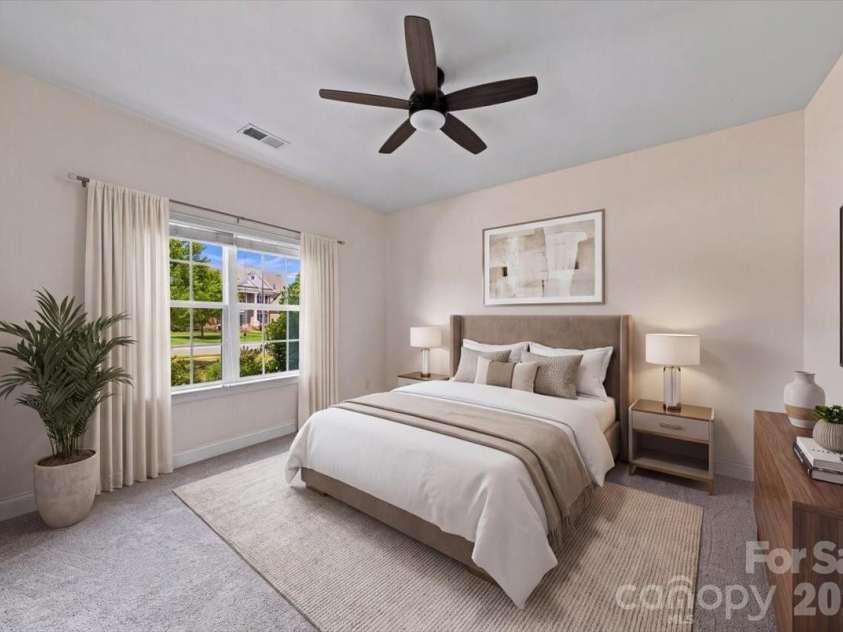 1006 Spring Rose Lane, Matthews, NC 28104.  MLS# CAR4382311, YatesRealty ID 25396. Virtually Staged Second Bedroom *new carpet*