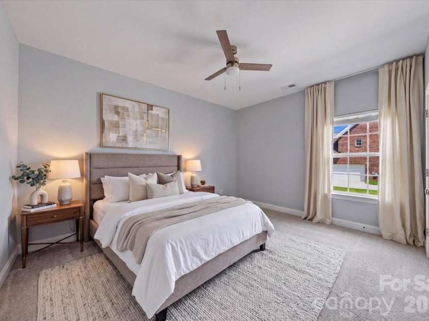 1006 Spring Rose Lane, Matthews, NC 28104.  MLS# CAR4382311, YatesRealty ID 25396. Virtually Staged Third Bedroom *new carpet*