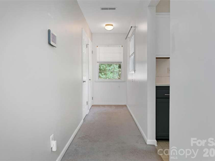 110 Lakeview Court, Brevard, NC 28712.  MLS# CAR4313488, YatesRealty ID 2540. Entryway into condominium is on the left.