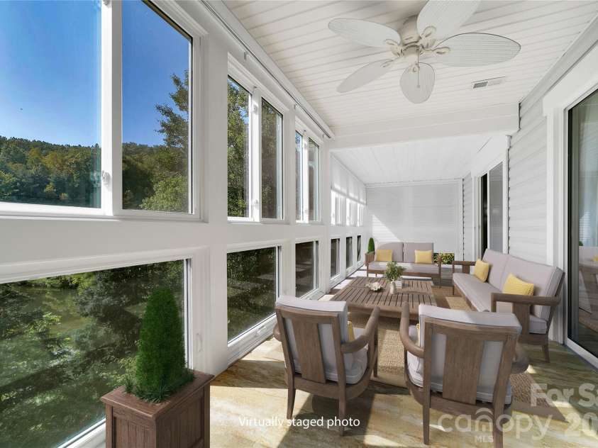 110 Lakeview Court, Brevard, NC 28712.  MLS# CAR4313488, YatesRealty ID 2540. Virtually staged sunroom.