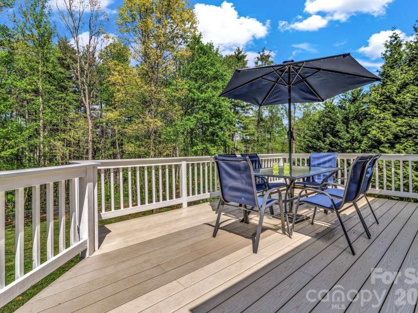 152 Joe Jenkins Road, Fairview, NC 28730.  MLS# CAR4350959, YatesRealty ID 25401. Big back deck