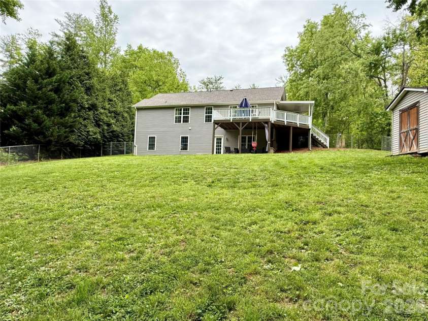 152 Joe Jenkins Road, Fairview, NC 28730.  MLS# CAR4350959, YatesRealty ID 25401. Huge fully fenced back yard