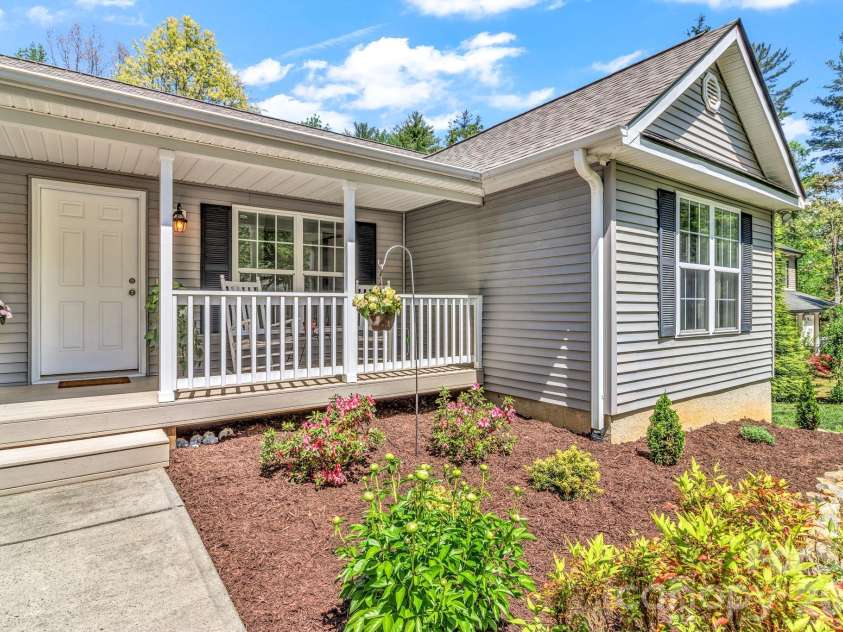 152 Joe Jenkins Road, Fairview, NC 28730.  MLS# CAR4350959, YatesRealty ID 25401. Pretty front porch