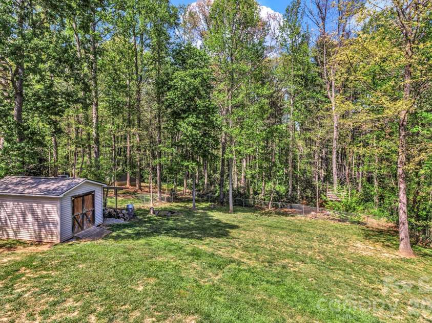 152 Joe Jenkins Road, Fairview, NC 28730.  MLS# CAR4350959, YatesRealty ID 25401. Storage shed