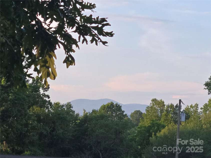 310 Walker Street Extension, East Flat Rock, NC 28726.  MLS# CAR4277756, YatesRealty ID 25401. 