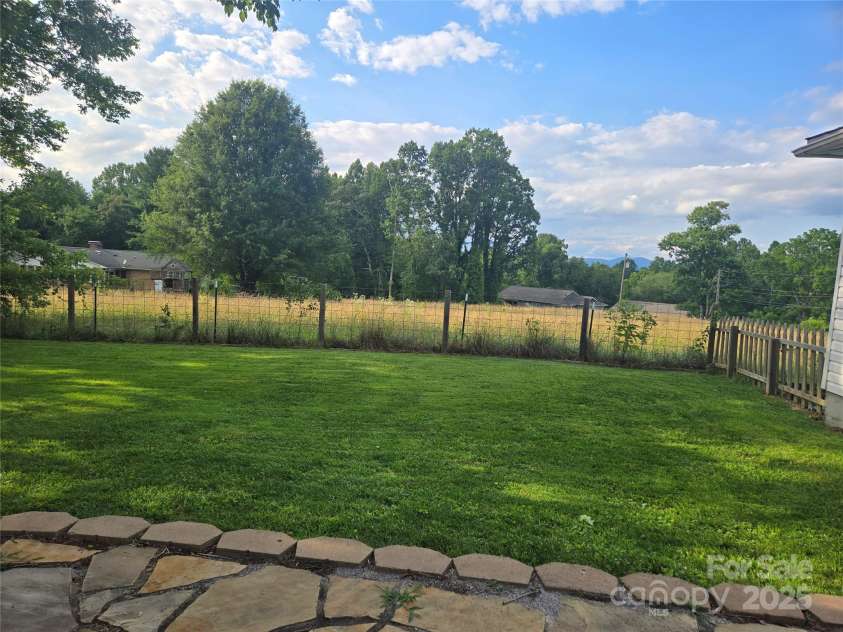 310 Walker Street Extension, East Flat Rock, NC 28726.  MLS# CAR4277756, YatesRealty ID 25401. 