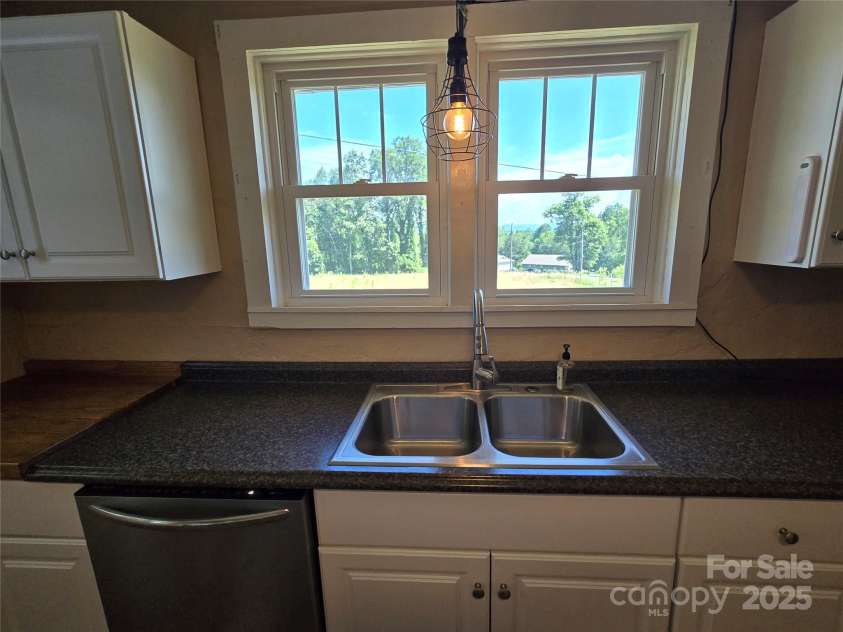 310 Walker Street Extension, East Flat Rock, NC 28726.  MLS# CAR4277756, YatesRealty ID 25401. 