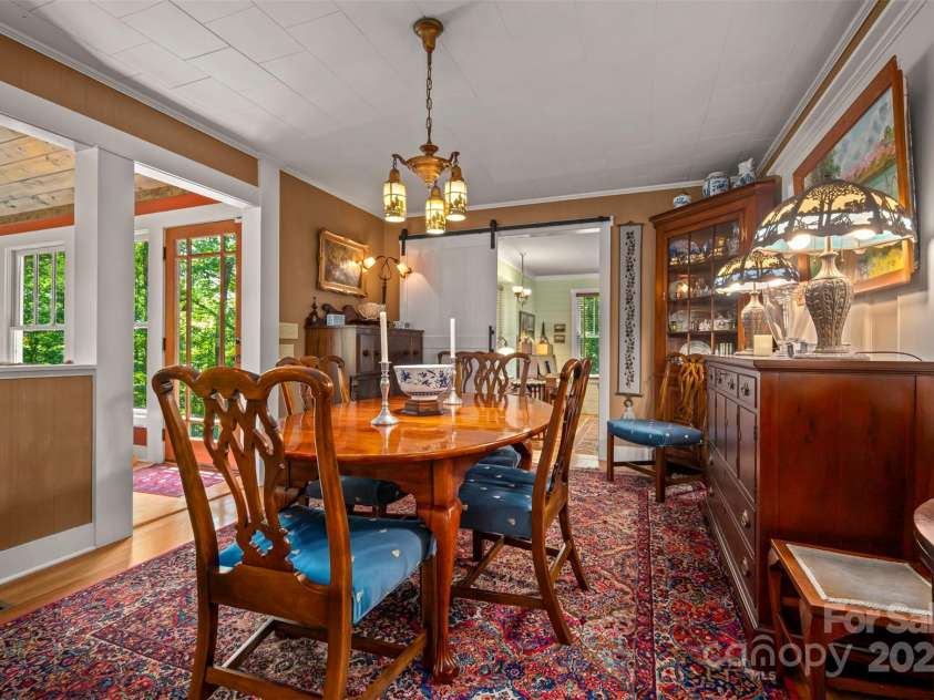 85 Red Bird Road, Tryon, NC 28782.  MLS# CAR4278468, YatesRealty ID 25406. Dining Room to Family Room