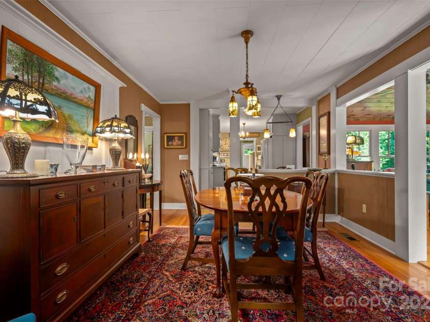 85 Red Bird Road, Tryon, NC 28782.  MLS# CAR4278468, YatesRealty ID 25406. Dining Room to Kitchen