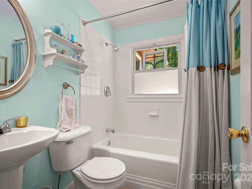 85 Red Bird Road, Tryon, NC 28782.  MLS# CAR4278468, YatesRealty ID 25406. Hall Bathroom