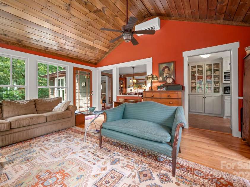 85 Red Bird Road, Tryon, NC 28782.  MLS# CAR4278468, YatesRealty ID 25406. Living Room to Dining Room
