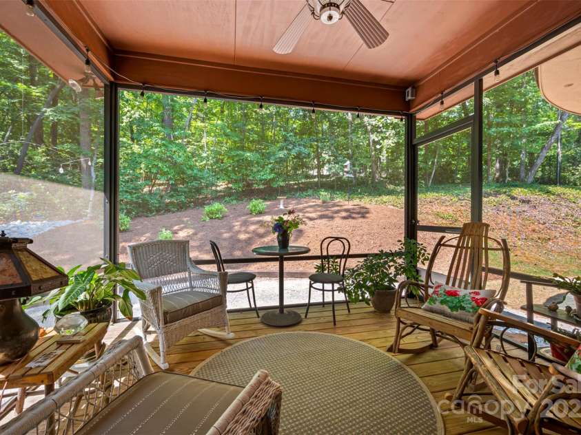 85 Red Bird Road, Tryon, NC 28782.  MLS# CAR4278468, YatesRealty ID 25406. Screened Porch