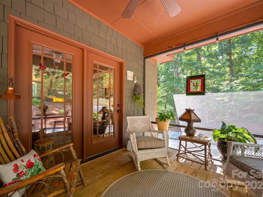 85 Red Bird Road, Tryon, NC 28782.  MLS# CAR4278468, YatesRealty ID 25406. Screened Porch