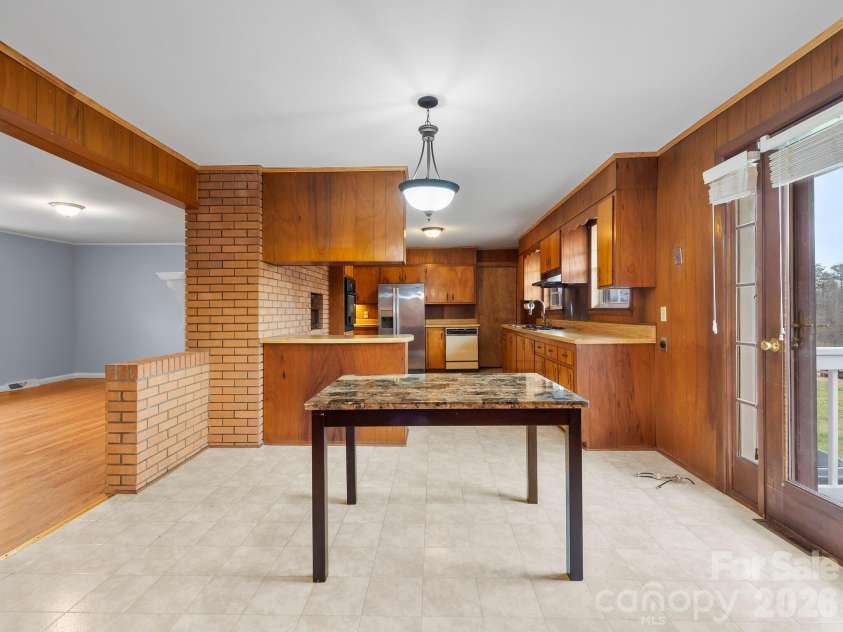 159 Big Island Road, Forest City, NC 28043.  MLS# CAR4374398, YatesRealty ID 25418. Dining area which opens onto the large back deck.