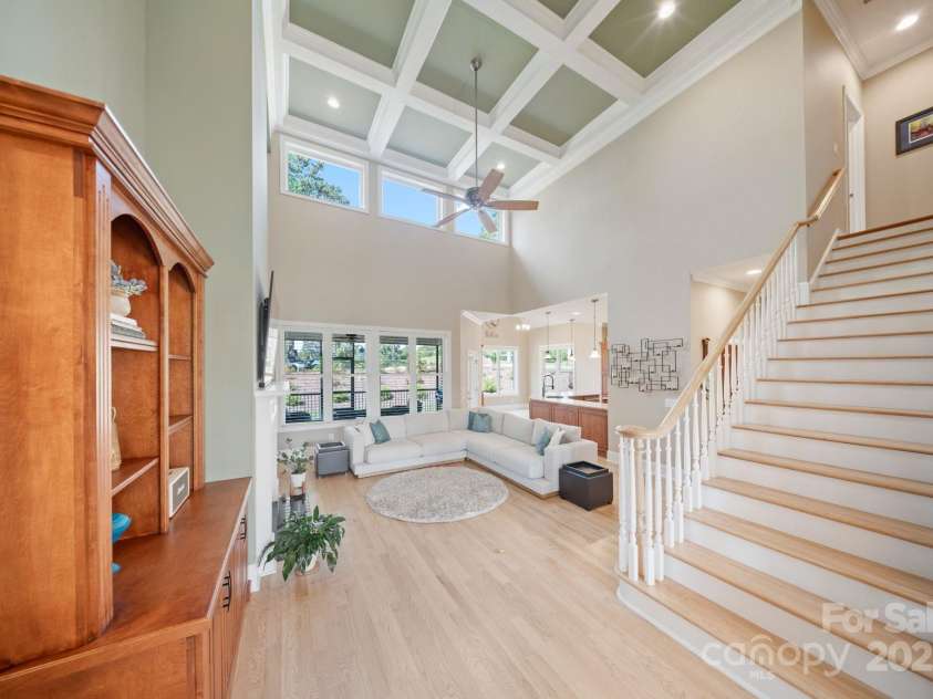 120 Cheyenne Lane, Statesville, NC 28677.  MLS# CAR4279452, YatesRealty ID 25421. Great Room with Soaring 20' coffered tray ceiling