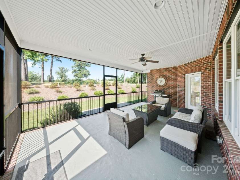 120 Cheyenne Lane, Statesville, NC 28677.  MLS# CAR4279452, YatesRealty ID 25421. Large Screened in Patio for Relaxation or Entertainment