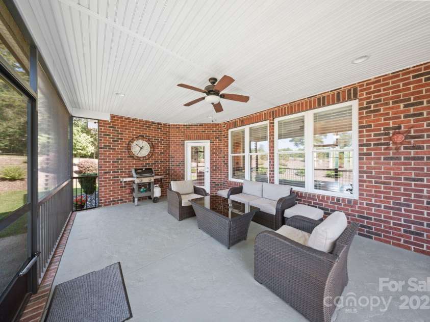 120 Cheyenne Lane, Statesville, NC 28677.  MLS# CAR4279452, YatesRealty ID 25421. Large Screened in Patio for Relaxation or Entertainment