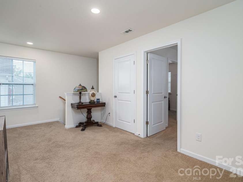 2818 Easton Knoll Drive, Dallas, NC 28034.  MLS# CAR4382766, YatesRealty ID 25423. Open space could be additional seating area upstairs