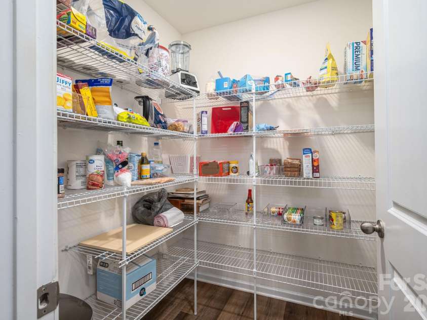 2818 Easton Knoll Drive, Dallas, NC 28034.  MLS# CAR4382766, YatesRealty ID 25423. Walk-in Kitchen Pantry
