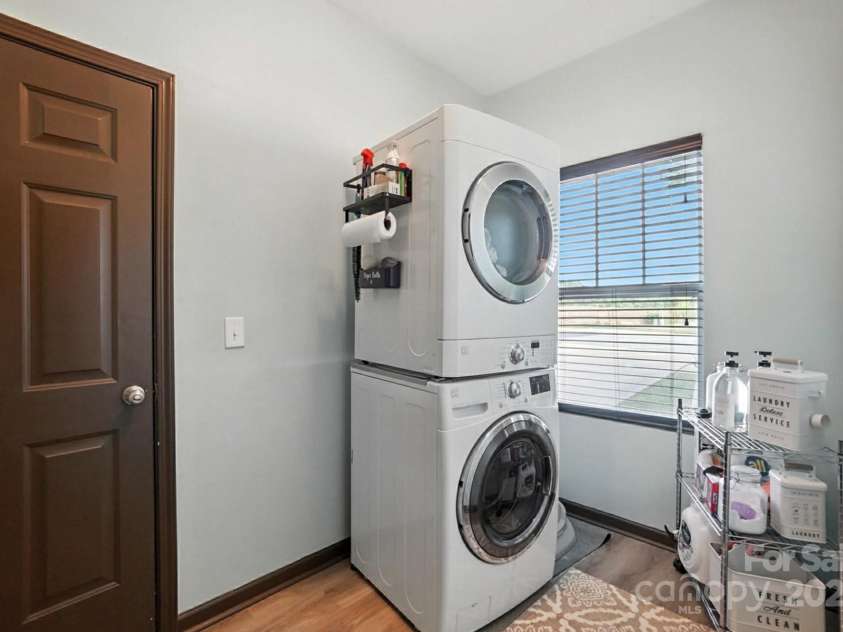 8152 Chilkoot Lane, Locust, NC 28097.  MLS# CAR4272952, YatesRealty ID 25429. Laundry room conveniently located near the garage