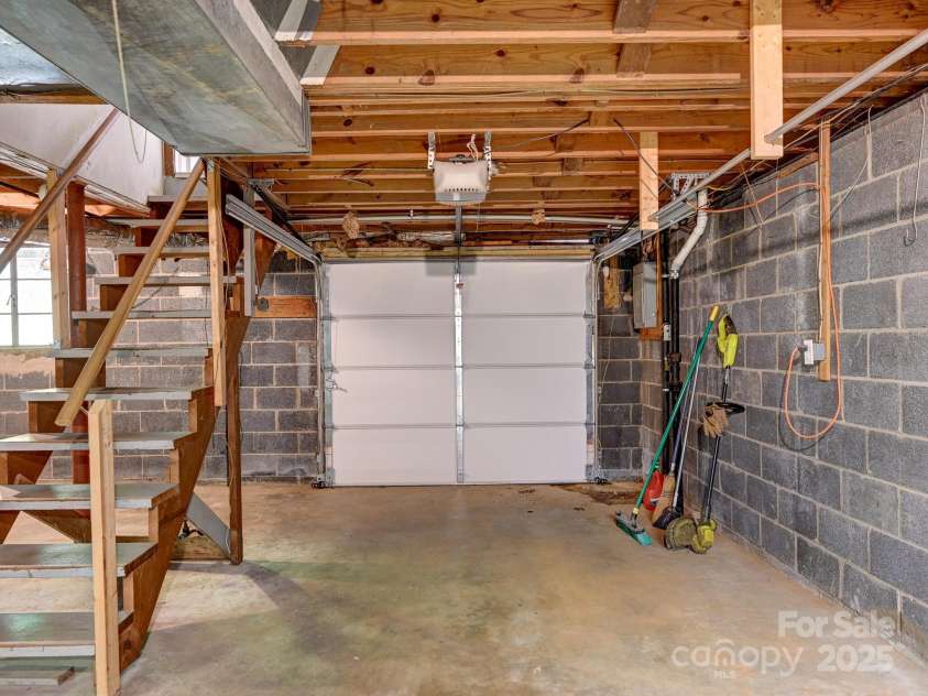 123 Blake Drive, Arden, NC 28704.  MLS# CAR4276075, YatesRealty ID 25432. Garage but Not until Pavement gets shaved Down.