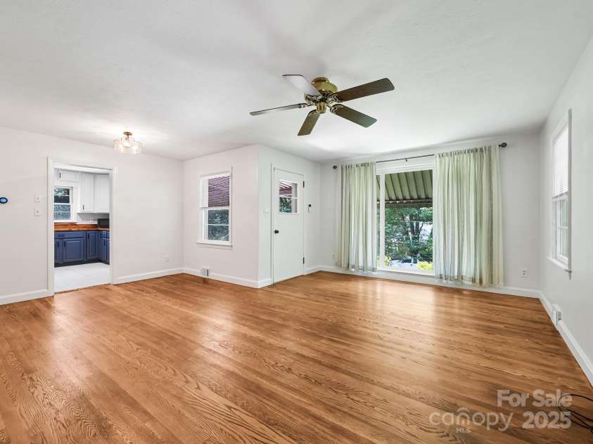 123 Blake Drive, Arden, NC 28704.  MLS# CAR4276075, YatesRealty ID 25432. Overall Living / Dining Area - Great Hardwood Floors