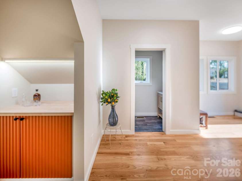 14 Da Vinci Court, Asheville, NC 28806.  MLS# CAR4382052, YatesRealty ID 25432. Curated drinks bar + half bath