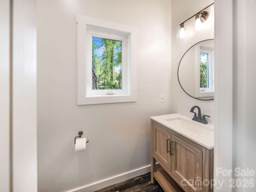 14 Da Vinci Court, Asheville, NC 28806.  MLS# CAR4382052, YatesRealty ID 25432. Main level half bath