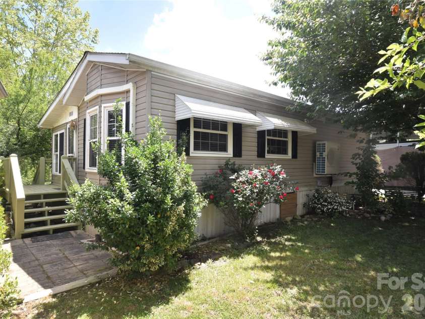 279 Mallard Loop, Waynesville, NC 28785.  MLS# CAR4380212, YatesRealty ID 25434. Home from the road in front