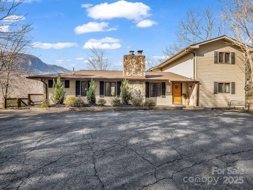 142 Palmer Place, Lake Lure, NC 28746.  MLS# CAR4218930, YatesRealty ID 25439. 